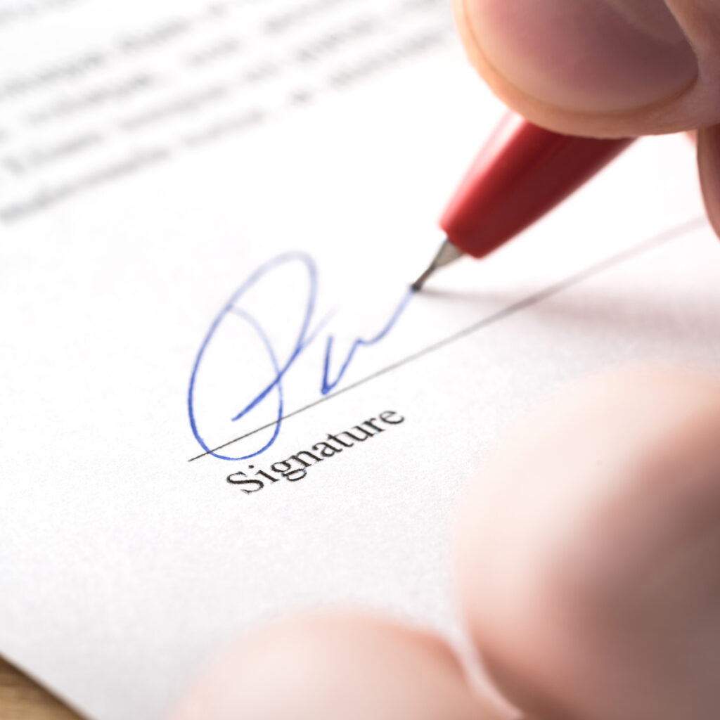 Signing Legal document shutterstock_1212797899 (2)